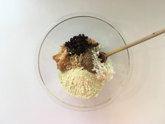 mixing up protein bar ingredients in a bowl
