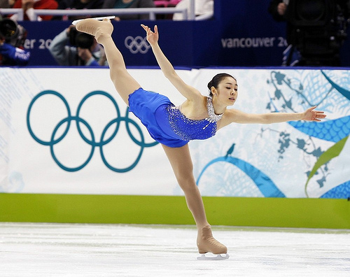 South Korea's Kim performs during women's free skating figure skating event at Vancouver 2010 Winter Olympics