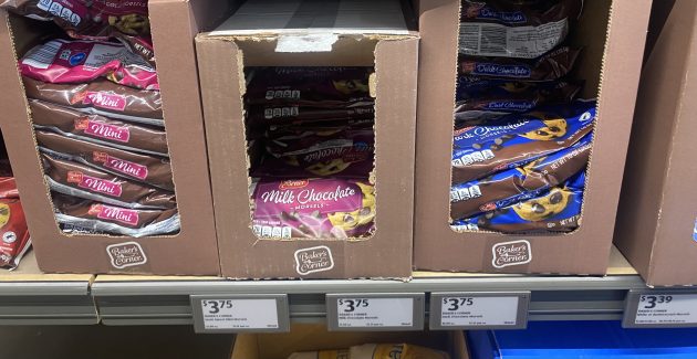 Cardboard display boxes filled with bags of chocolate chips.