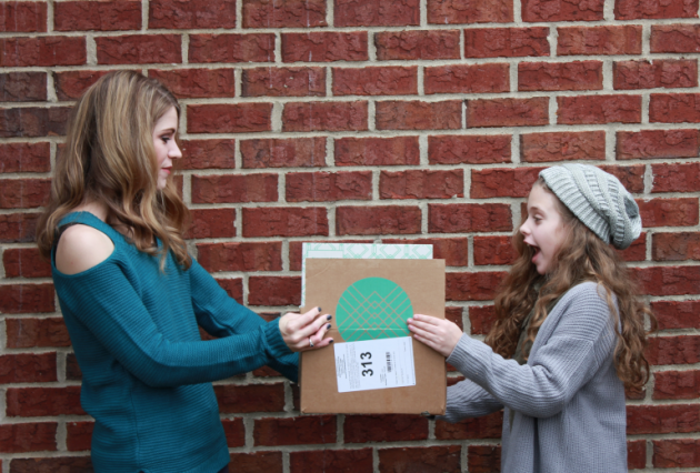 mom and daughter holding Stitch Fix box