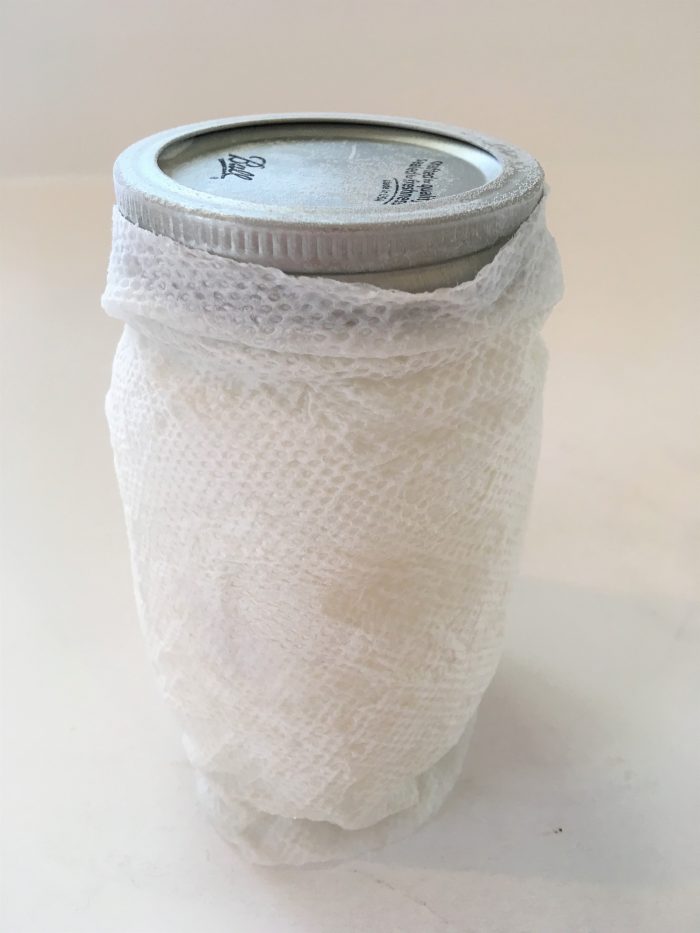 wet paper towel around a mason jar of ice cream