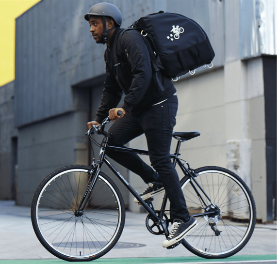 Postmates Driver on Bicycle