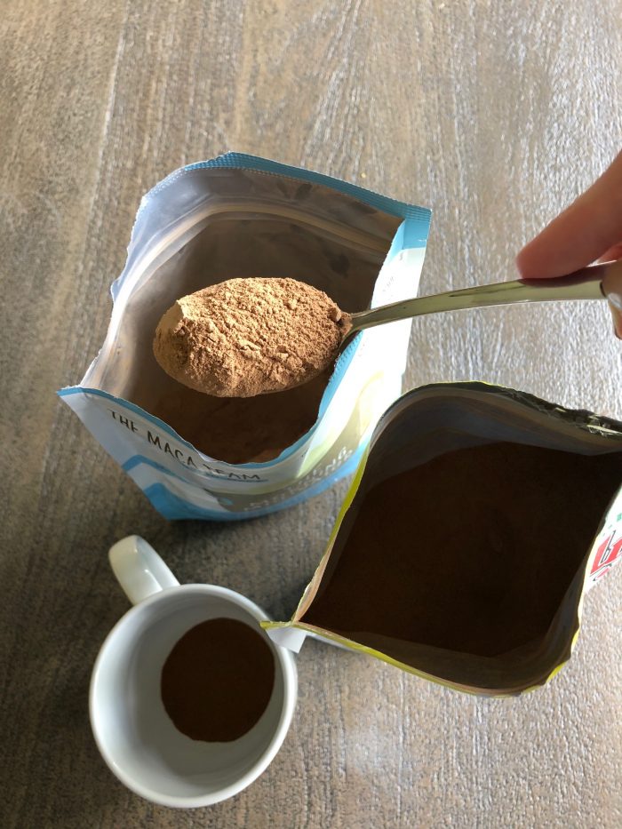 scooping maca blend into cup