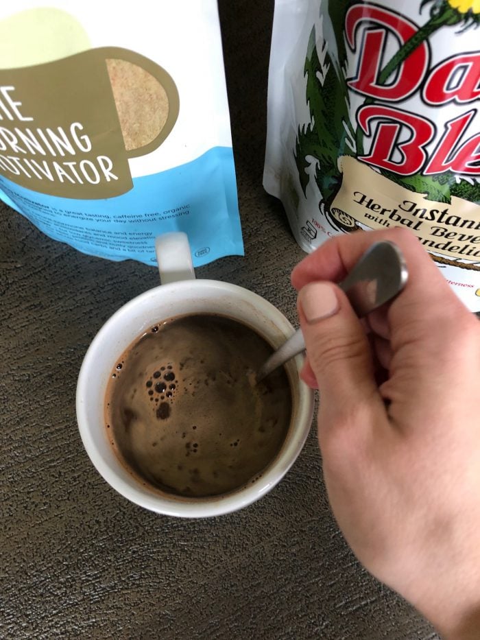 stirring morning beverage in a mug