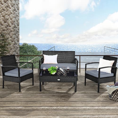 Rattan 4-Piece Patio Conversation Set with Loveseat and Coffee Table