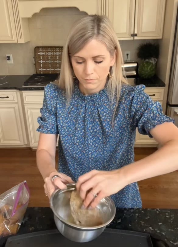 dipping bread in egg mixture