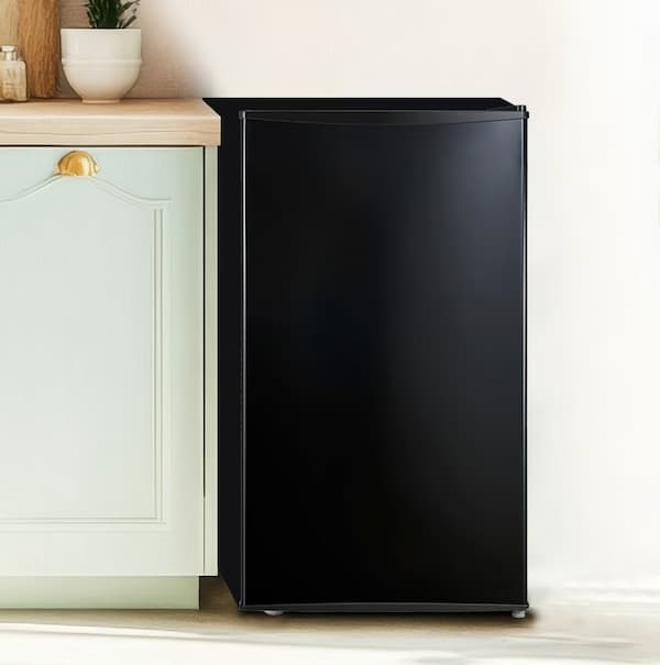 black mini fridge by cabinets